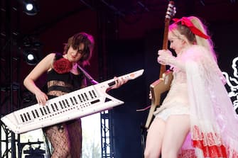 INDIO, CALIFORNIA - APRIL 13: (FOR EDITORIAL USE ONLY) (L-R) Aurora Nishevci and Emily Roberts of The Last Dinner Party perform at the Gobi Tent during the 2024 Coachella Valley Music and Arts Festival at Empire Polo Club on April 13, 2024 in Indio, California. (Photo by Frazer Harrison/Getty Images for Coachella)