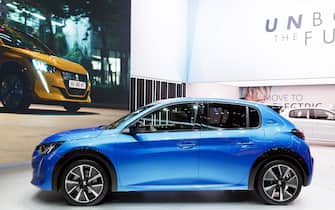 epa07415590 The Peugeot 208 e is presented during the first media day at the 89th Geneva International Motor Show in Geneva, Switzerland, 05 March 2019. The Motor Show will open its gates to the public from 07 to 17 March presenting more than 180 exhibitors and more than 100 World and European premieres.  EPA/CYRIL ZINGARO