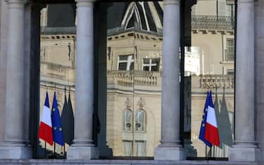 TOPSHOT - A picture taken on September 14, 2017 in Paris shows a glass window reflection at the Elysee presidential Palace after a cabinet meeting. (Photo by ludovic MARIN / AFP) (Photo by LUDOVIC MARIN/AFP via Getty Images)