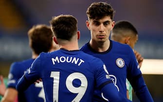 Chelsea's Kai Havertz (right) and Mason Mount hug each other at the end of the Premier League match at Stamford Bridge, London. Picture date: Monday March 8, 2021.