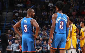 OKLAHOMA CITY, OK- NOVEMBER 9: Chris Paul #3  and Shai Gilgeous-Alexander #2 of the Oklahoma City Thunder share a conversation during the game against the Golden State Warriors on November 9, 2019 at Chesapeake Energy Arena in Oklahoma City, Oklahoma. NOTE TO USER: User expressly acknowledges and agrees that, by downloading and or using this photograph, User is consenting to the terms and conditions of the Getty Images License Agreement. Mandatory Copyright Notice: Copyright 2019 NBAE (Photo by Zach Beeker/NBAE via Getty Images)