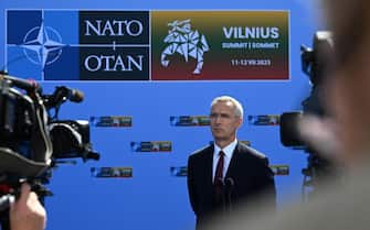 epa10738889 NATO Secretary General Jens Stoltenberg speaks to the media as he arrives at the NATO summit in Vilnius, Lithuania, 11 July 2023. The North Atlantic Treaty Organization (NATO) Summit will take place in Vilnius on 11 and 12 July 2023 with the alliance's leaders expected to adopt new defence plans.  EPA/FILIP SINGER