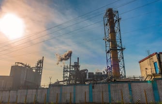 Polluted smoke emitted from the chimney of a Small scale Industry.