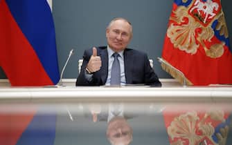 TOPSHOT - Russian President Vladimir Putin participates via video link in a ceremony to launch the construction of a third reactor of the Turkish nuclear power plant built by Russia's energy giant Rosatom, in Moscow on March 10, 2021. (Photo by Alexey DRUZHININ / SPUTNIK / AFP) (Photo by ALEXEY DRUZHININ/SPUTNIK/AFP via Getty Images)