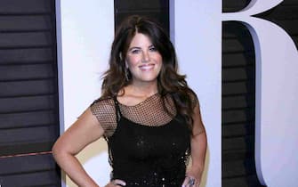 epa05817894 Monica Lewinsky arriving for the 2017 Vanity Fair Oscar Party following the 89th annual Academy Awards ceremony in Beverly Hills, California, USA, 26 February 2017. The Oscars are presented for outstanding individual or collective efforts in 24 categories in filmmaking.  EPA/NINA PROMMER