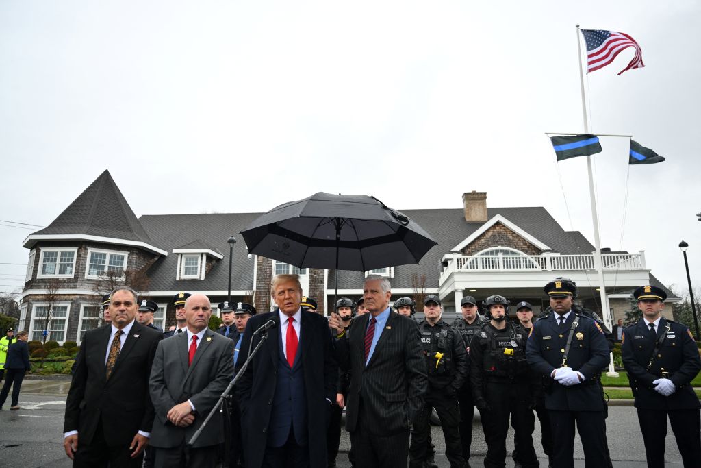 Former US President Donald Trump speaks to the press after attending the wake for New York Police Department (NYPD) Officer Jonathan Diller in Massapequa, Long Island, New York, on March 28, 2024. Diller was part of the NYPD's Critical Response Team when he was gunned down during a traffic stop in Queens on the night of March 25. (Photo by ANGELA WEISS / AFP) (Photo by ANGELA WEISS/AFP via Getty Images)