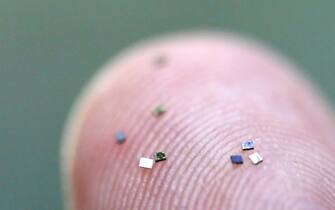 ZELENOGRAD, MOSCOW, RUSSIA – SEPTEMBER 6, 2021: Showing a microchip at a workshop manufacturing microchips for electronic passports at the Mikron plant. Alexander Ryumin/TASS/Sipa USA