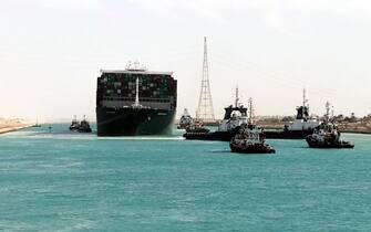 epa09105080 A handout photograph made available by the Syez Canal Authority shows the Ever Given container ship after it was refloated in the Suez Canal, Egypt, 29 March 2021. The head of the Suez Canal Authority announced on 29 March that the large container ship, which ran aground in the Suez Canal on 23 March, is now free floating after responding to the pulling maneuvers.  EPA/SUEZ CANAL AUTHORITY / HANDOUT  HANDOUT EDITORIAL USE ONLY/NO SALES