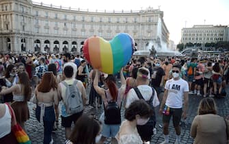 Members and supporters of the lesbian, gay, bisexual and transgender (LGBT) community take part in the Rome Pride parade in Rome, Italy, 26 June 2021. ANSA/FABIO CIMAGLIA