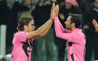 Juventus FC's  Alessandro Matri (L) celebrates with his teammate Mirko Vucinic  (R) after scoring a goal during the Italian Serie A soccer match against AC Fiorentina at Juventus Stadium in Turin, Italy, on 25 October. ANSA/ALESSANDRO DI MARCO