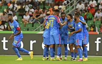 epa11121796 DR Congo players celebrate a goal scored by Chancel Mangulu Mbemba of DR Congo (c) during the 2023 Africa Cup of Nations quarterfinal match between DR Congo and Guinea at Alassane Ouattara Stadium in Abidjan, Ivory Coast, 02 February 2024.  EPA/BackpagePix