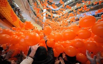 YANTAI, CHINA - FEBRUARY 14: Balloons fall on the customers during a Valentine's Day celebration at Joy City shopping mall on February 14, 2023 in Yantai, Shandong Province of China. (Photo by Tang Ke/VCG via Getty Images)