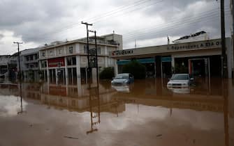 epa10843208 A flooded road, during the storm named Daniel in the area of Volos, Magnesia, Greece, 06 September 2023. The storm 'Daniel' sweeping through most of Greece with heavy rain and lightning caused extensive damage in the power network at Volos, Mt. Pilio, elsewhere in the Magnissia prefecture, as well as in the Sporades Islands.  EPA/YANNIS KOLESIDIS