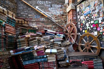 The book steps consisting of water damaged books in the bookshop Libreria Acqua Alta, Venice (Photo by John Walton/PA Images via Getty Images)