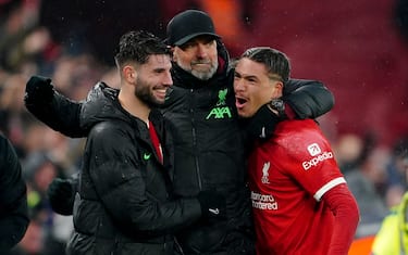 Liverpool manager Jurgen Klopp (centre) celebrates with Dominik Szoboszlai (left) and Darwin Nunez (right) after the Premier League match at Anfield, Liverpool. Picture date: Sunday December 3, 2023. (Photo by Peter Byrne/PA Images via Getty Images)