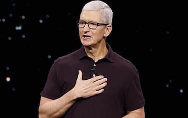 epa10167560 Apple CEO Tim Cook reacts as he speaks in the Steve Jobs Theatre during an Apple Special Event on the campus of Apple Park in Cupertino, California, USA, 07 September 2022.  EPA/JOHN G. MABANGLO