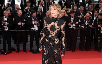 epa10641173 Isabelle Huppert arrives for the screening of 'Killers of the Flower Moon' during the 76th annual Cannes Film Festival, in Cannes, France, 20 May 2023. The festival runs from 16 to 27 May.  EPA/MOHAMMED BADRA