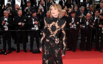 epa10641173 Isabelle Huppert arrives for the screening of 'Killers of the Flower Moon' during the 76th annual Cannes Film Festival, in Cannes, France, 20 May 2023. The festival runs from 16 to 27 May.  EPA/MOHAMMED BADRA