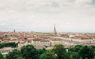 Elevated view of Turin with the dome of the "Mole Antonelliana". Cityscape of Turin, Italy