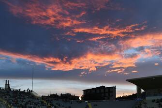 The sun sets over the Artemio-Franchi stadium in Florence, Tuscany, prior to the Italian Serie A football match between Fiorentina and Napoli on August 28, 2022. (Photo by Alberto PIZZOLI / AFP) (Photo by ALBERTO PIZZOLI/AFP via Getty Images)