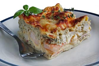 Seafood lasagne with shrimps, scollops,crab meat, spinich with Mozzarella,Parmesan, Ricotta cheese.