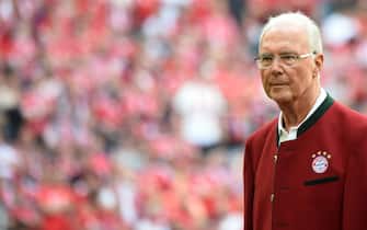 (FILES) Bayern Munich's Honorary President and German football legend Franz Beckenbauer attends a ceremony during a break of the German first division Bundesliga football match FC Bayern Munich vs VfB Stuttgart in Munich, southern Germany, on May 12, 2018. Franz Beckenbauer died aged 78 the German football association announced on January 8, 2024. (Photo by Christof STACHE / AFP) / RESTRICTIONS: DURING MATCH TIME: DFL RULES TO LIMIT THE ONLINE USAGE TO 15 PICTURES PER MATCH AND FORBID IMAGE SEQUENCES TO SIMULATE VIDEO. == RESTRICTED TO EDITORIAL USE == FOR FURTHER QUERIES PLEASE CONTACT DFL DIRECTLY AT + 49 69 650050