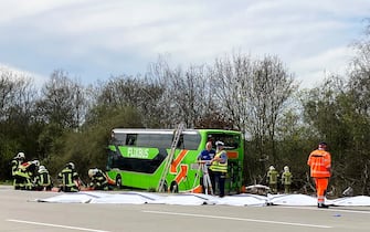 27 March 2024, Saxony, Schkeuditz: A coach stands at the scene of an accident on the A9. At least five people have died in an accident involving a coach on the A9 near Leipzig. This was announced by the police on request. There were also numerous injuries in the accident on Wednesday. Photo: Birgit Zimmermann/dpa (Photo by Birgit Zimmermann/picture alliance via Getty Images)
