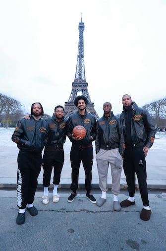 PARIS, FRANCE - JANUARY 09:  Darius Garland #10, Donovan Mitchell #45 Jarrett Allen #31, Caris LeVert #3 and Evan Mobley #4 of the Cleveland Cavaliers pose for a photo in front of the Eiffel Tower as part of NBA Paris Games 2024 on January 09, 2024 in Paris, France. NOTE TO USER: User expressly acknowledges and agrees that, by downloading and/or using this Photograph, user is consenting to the terms and conditions of the Getty Images License Agreement. Mandatory Copyright Notice: Copyright 2024 NBAE (Photo by Nathaniel S. Butler/NBAE via Getty Images)