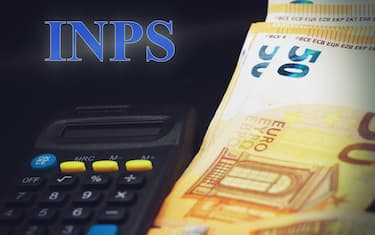 Florence, Italy, June 23rd 2024: Calculator with banknotes and the text "INPS" also known as Istituto Nazionale della Previdenza Sociale meaning National Institute of Social Security.