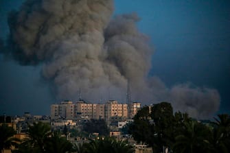 epa11059812 Smoke rises during Israeli military operations in the east of Al Maghazi and Al Bureije refugee camps, southern Gaza Strip on, 05 January 2024. More than 22,300 Palestinians and at least 1,300 Israelis have been killed, according to the Palestinian Health Ministry and the Israel Defense Forces (IDF), since Hamas militants launched an attack against Israel from the Gaza Strip on 07 October, and the Israeli operations in Gaza and the West Bank which followed it. Since 07 October, up to 1.9 million people, or more than 85 percent of the population, have been displaced throughout the Gaza Strip, some more than once, according to the United Nations Relief and Works Agency for Palestine Refugees in the Near East (UNRWA), which added that most civilians in Gaza are in 'desperate need of humanitarian assistance and protection'.  EPA/MOHAMMED SABER