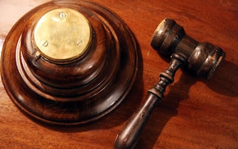 A gavel, or judge's hammer with sound block