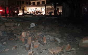 A view of the debris of a wall brought down in the earthquake in Jishishan county in northwest China's Gansu province Tuesday, Dec. 19, 2023. A magnitude-6.2 earthquake jolted the remote and mountainous county around midnight on Tuesday, killing at least 111 people and injuring more than 230, according to Chinese state media.  (Photo by FEATURECHINA/Newscom/Sipa USA)