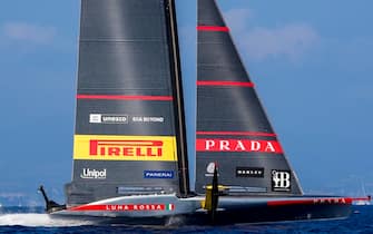 epa11561747 Luna Rossa Prada Pirelli compete in a match race during the Preliminary Regatta of the 37th America's Cup, in Barcelona, Spain, 23 August 2024.  EPA/Siu Wu