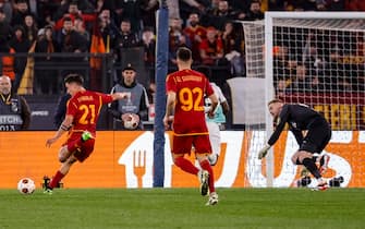 AS Roma's Paulo Dybala (L) scores during the UEFA Europa League round of sixteen first leg soccer match between AS Roma and Brighton and Hove Albion at the Olimpico stadium in Rome, Italy, 7 March 2024. ANSA/FABIO FRUSTACI