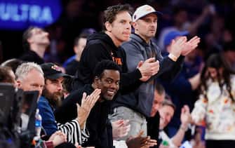 NEW YORK, NEW YORK - APRIL 22: Comedian Chris Rock (L) and actor Ben Stiller (C) attend the game between the New York Knicks and the Philadelphia 76ers in Game Two of the Eastern Conference First Round Playoffs at Madison Square Garden on April 22, 2024 in New York City. The Knicks won 104-101. NOTE TO USER: User expressly acknowledges and agrees that, by downloading and or using this photograph, User is consenting to the terms and conditions of the Getty Images License Agreement. (Photo by Sarah Stier/Getty Images)