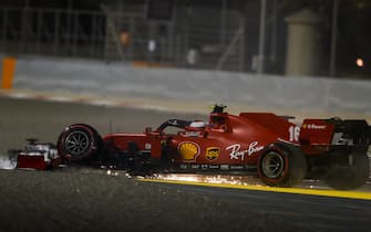 BAHRAIN INTERNATIONAL CIRCUIT, BAHRAIN - DECEMBER 06: Charles Leclerc, Ferrari SF1000 with broken front suspention after a first lap crash with Sergio Perez, Racing Point RP20 during the Sakhir GP at Bahrain International Circuit on Sunday December 06, 2020 in Sakhir, Bahrain. (Photo by Charles Coates / LAT Images)