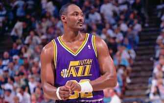 SACRAMENTO, CA - 1996: Karl Malone #32 of the Utah Jazz looks on against the Sacramento Kings circa 1996 at Arco Arena in Sacramento, California. NOTE TO USER: User expressly acknowledges and agrees that, by downloading and or using this photograph, User is consenting to the terms and conditions of the Getty Images License Agreement. Mandatory Copyright Notice: Copyright 1996 NBAE (Photo by Rocky Widner/NBAE via Getty Images)