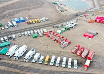 epa10484823 An aerial view of rescue vehicles near the site of a collapsed coal mine in Alxa League, north China's Inner Mongolia Autonomous Region, 23 February 2023. The landslide occurred at the rescue site at around 6 p.m. China Standard Time (CST) on 22 February, according to the rescue headquarters. As of 23 February, more than 900 people had rushed to the site for rescue operations after an open-pit mine collapsed in Alxa Left Banner at around 1 p.m. CST on 22 February, resulting in two deaths, six injuries, and 53 people missing.  EPA/XINHUA/LIAN ZHEN CHINA OUT / MANDATORY CREDIT  EDITORIAL USE ONLY