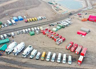 epa10484823 An aerial view of rescue vehicles near the site of a collapsed coal mine in Alxa League, north China's Inner Mongolia Autonomous Region, 23 February 2023. The landslide occurred at the rescue site at around 6 p.m. China Standard Time (CST) on 22 February, according to the rescue headquarters. As of 23 February, more than 900 people had rushed to the site for rescue operations after an open-pit mine collapsed in Alxa Left Banner at around 1 p.m. CST on 22 February, resulting in two deaths, six injuries, and 53 people missing.  EPA/XINHUA/LIAN ZHEN CHINA OUT / MANDATORY CREDIT  EDITORIAL USE ONLY