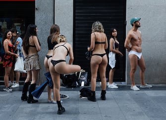 MADRID, SPAIN - JUNE 22: Several people queue up to take part in Desigual's Seminaked event, at Desigual's store on Preciados street, June 22, 2023, in Madrid, Spain. Clothing brand Desigual has organized the 'Seminaked' event, in which it invites its first 100 customers to arrive at the store in their underwear, choose the two items they like best from the collection and wear them for free. (Photo By Eduardo Parra/Europa Press via Getty Images)