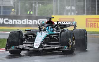 CIRCUIT GILLES-VILLENEUVE, CANADA - JUNE 09: Pole man George Russell, Mercedes F1 W15, heads to the grid during the Canadian GP at Circuit Gilles-Villeneuve on Sunday June 09, 2024 in Montreal, Canada. (Photo by Mark Sutton / Sutton Images)