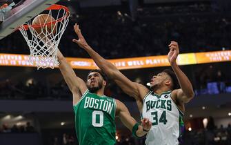 MILWAUKEE, WISCONSIN - MAY 07: Jayson Tatum #0 of the Boston Celtics is fouled by Giannis Antetokounmpo #34 of the Milwaukee Bucks during the second quarter of Game Three of the Eastern Conference Semifinals at Fiserv Forum on May 07, 2022 in Milwaukee, Wisconsin. NOTE TO USER: User expressly acknowledges and agrees that, by downloading and or using this photograph, User is consenting to the terms and conditions of the Getty Images License Agreement. (Photo by Stacy Revere/Getty Images)