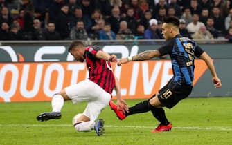 FC Inter forward Lautaro Martinez and AC Milan's defender Mateo Musacchio during the Italian Serie A soccer match between AC Milan and FC Inter at Giuseppe Meazza Stadium in Milan, Italy, 17 March 2019. ANSA / Roberto Bregani