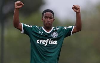 epa09934637 Midfielder Endrick, 15, plays a game as a starter for Palmeiras in Guarulhos, Brazil, 08 May 2022. Endrick, one of the strongest new promises in Brazilian football, continues to accumulate experience for his long-awaited debut in the Palmeiras professional squad and he was once again a starter with the 'Verdao' sub'20 team. Before the debut, which should happen after he turns 16 at the end of July and signs a professional contract, the local and foreign sports press and the eager Palmeiras fans have to settle for these performances. Before the gaze of several foreign media, Endrick started in the 5-1 win over Sao Jose in the Paulista Sub'20 Championship.  EPA/Fernando Bizerra