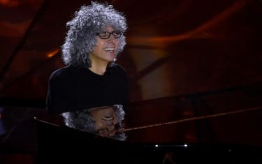 Italian music composer Giovanni Allevi performs on stage at the Ariston theatre during the 74th Sanremo Italian Song Festival, in Sanremo, Italy, 07 February 2024. The music festival will run from 06 to 10 February 2024.  ANSA/RICCARDO ANTIMIANI