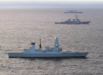 epa07587138 A handout photo made available by the British Royal Navy showing the Royal Navy warship HMS Defender (front) off the coast of Scotland, 19 May 2019, issued 20 May 2019. The Royal Navy reported that the Type 45 destroyer  tested her Sea Viper missile system, the missile flew four times the speed of sound before obliterating an incoming drone target designed to simulate a projectile attack on the ship. It marks the first time HMS Defender has taken on this particular type of target â one that is significantly more challenging as it flies faster and lower than others before it. The missile firing took place as part of NATO Exercise Formidable Shield. It proves the Portsmouth-based shipâs ability to defend herself and other ships around her from attack. Equipped with a Wildcat helicopter from Yeovilton-based 815 Naval Air Squadron, state-of-the-art Sampson radar and the Sea Viper missile system, HMS Defender was a potent addition alongside nine other navies at the Hebrides range in Scotland. Led by the US Navyâs 6th Fleet, the exercise was the largest of its type with 13 ships, more than 10 aircraft and in excess of 3,300 personnel taking part.  EPA/LPhot Ben Shread / BRITISH ROYAL NAVY / HANDOUT MANDATORY CREDIT BRITISH ROYAL NAVY: CROWN COPYRIGHT HANDOUT EDITORIAL USE ONLY/NO SALES
