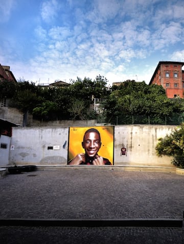 It was the night of 6 September 2020 when Willy Monteiro Duarte, a 21-year-old of Cape Verdean origins, was brutally killed in Colleferro, in the province of Frosinone, during a beating at the hands of four peers. A horrendous black news page which includes prevarication, delinquency and racial hatred, which has been on fire for press and social days. Thanks to an initiative promoted by Vanity Fair, Willy's memory is now celebrated with a large mural in Piazzale Aldo Moro, a meeting point in the historic center of Paliano, where the boy lived. To create the work - inaugurated on the evening of September 15 - Ozmo, one of the most famous Italian street artists, who told the genesis of his latest work on his Facebook page.Paliano (Rome) Italy, September 20th, 2020
(Photo by Rocco Spaziani) | usage worldwide