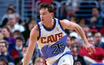 CLEVELAND - NOVEMBER 30: Mark Price #25 of the Cleveland Cavaliers dribbles  during a game played on November 30, 1994 at Gund Arena in Cleveland, Ohio. NOTE TO USER: User expressly acknowledges and agrees that, by downloading and/or using this photograph, user is consenting to the terms and conditions of the Getty Images License Agreement.  Mandatory Copyright Notice: Copyright 1994 NBAE (Photo by Noren Trotman/NBAE via Getty Images)