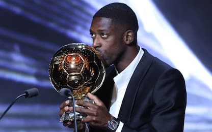 Paris Saint-Germain's French forward Ousmane Dembele kisses the Ballon d'Or award during the 2025 Ballon d'Or France Football award ceremony at the Theatre du Chatelet in Paris on September 22, 2025. (Photo by Franck FIFE / AFP) (Photo by FRANCK FIFE/AFP via Getty Images)          