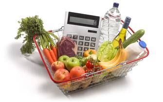 using calculator whilst shopping for healthy food, to keep within domestic budget